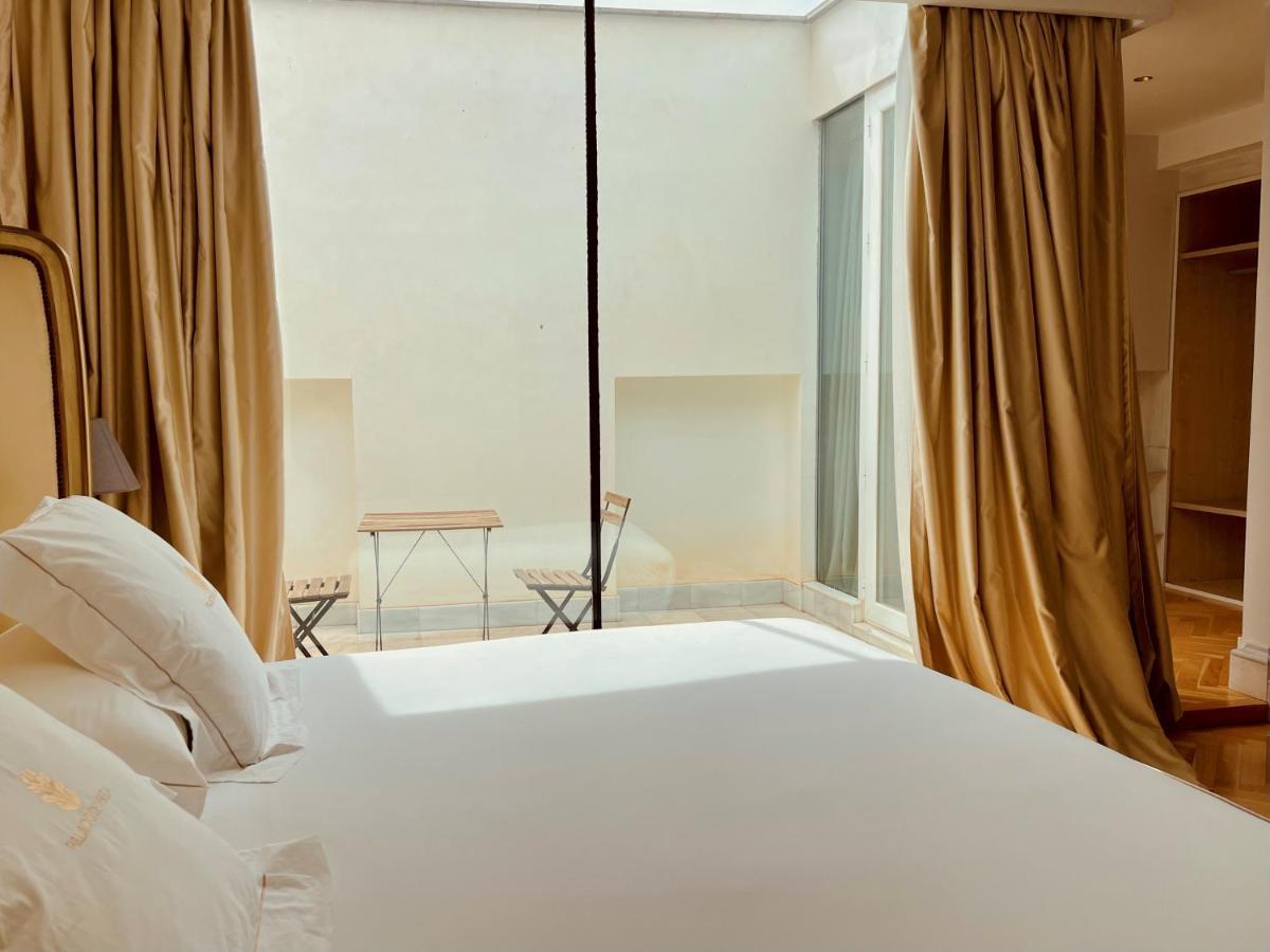 Hotel Palacio De Ubeda 5 G.L Bagian luar foto A room at the hotel